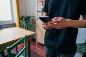 man using cell phone